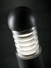 Lampada da esterno in alluminio pressofuso con diffusore in vetro trasparente e alette frangiluce grafite