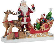 LED resin Santa Claus with reindeer and red sleigh cm38,5x17,5h27